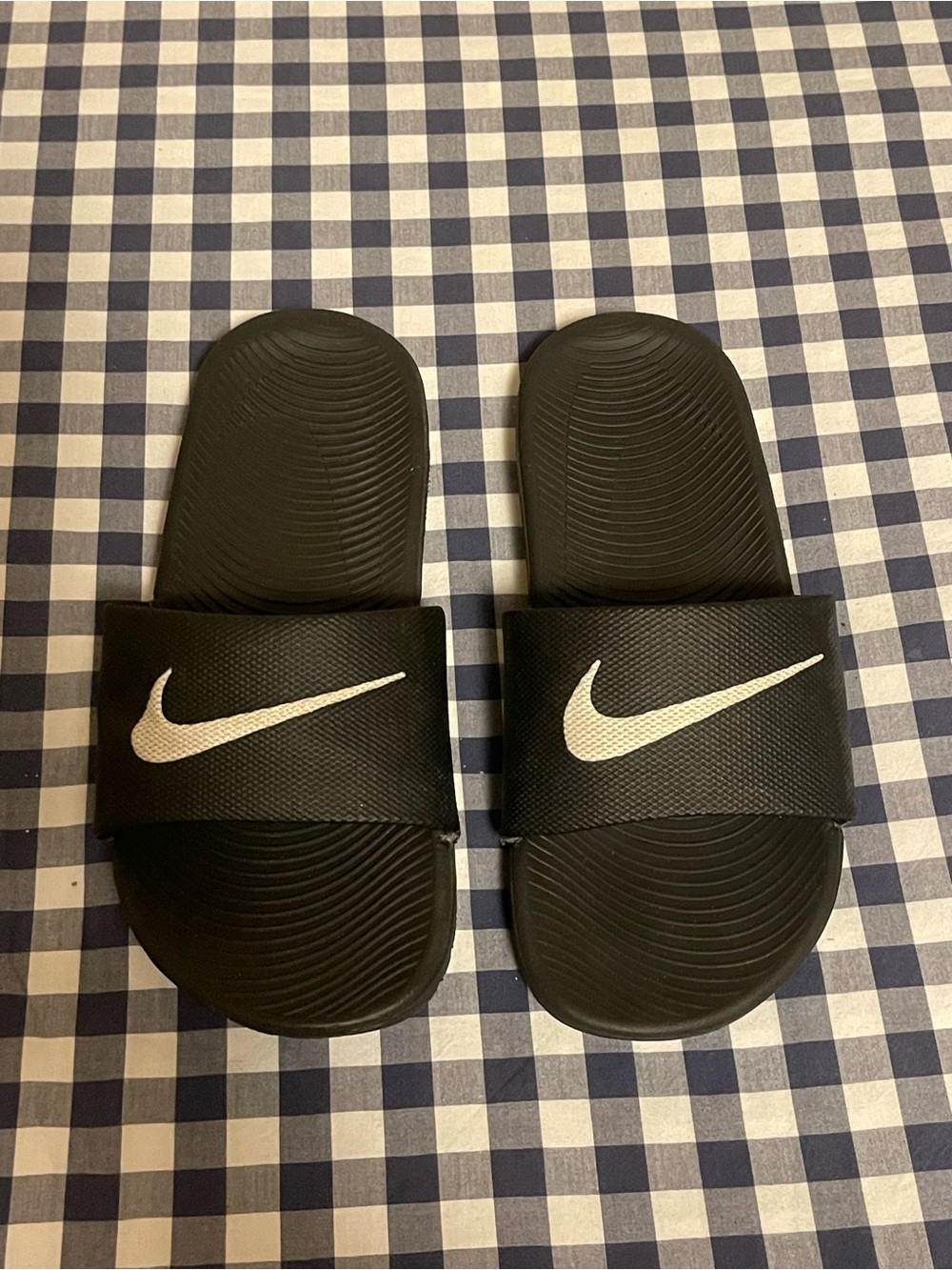 Nike Black Slides with White Swoosh Logo